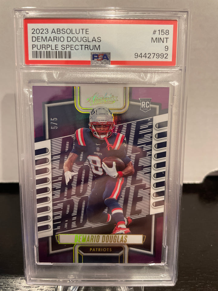 Demario Douglas 2023 Panini Absolute Purple Spectrum Rookie, 5/5, PSA 9 Mint